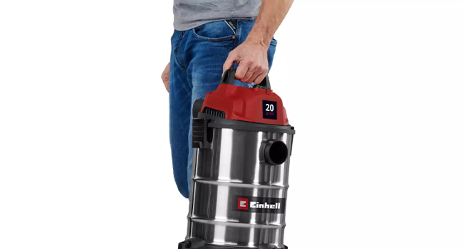Людина переносить пилосос Einhell TC-VC 2045 S за верхню ручку.