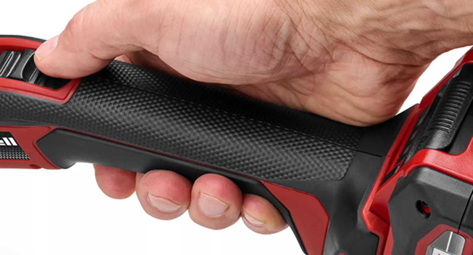 Рука держит резак Einhell TE-UC 18/6 Li - Solo за эргономичную рукоятку Softgrip.