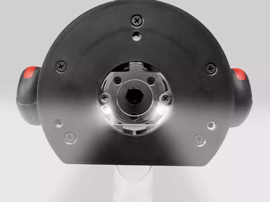 Нижня частина фрезера Einhell TP-RO 1400 E з вбудованим світлодіодним освітленням навколо фрезерного шпинделя.