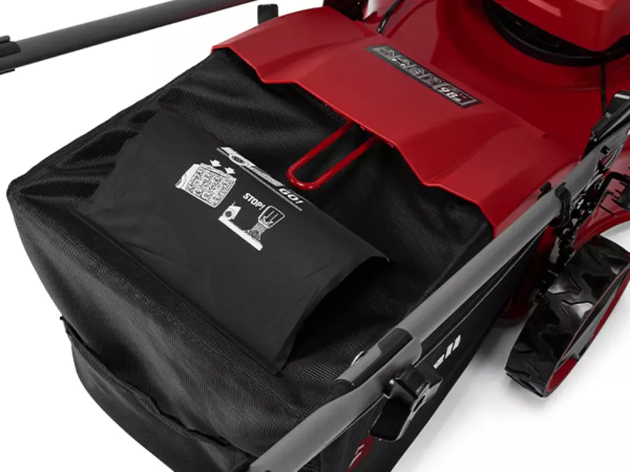 Крупный план травосборника беспроводной газонокосилки Einhell GC-CM 36/51 S Li BL (2x5,2 Ач) со встроенным индикатором уровня заполнения.